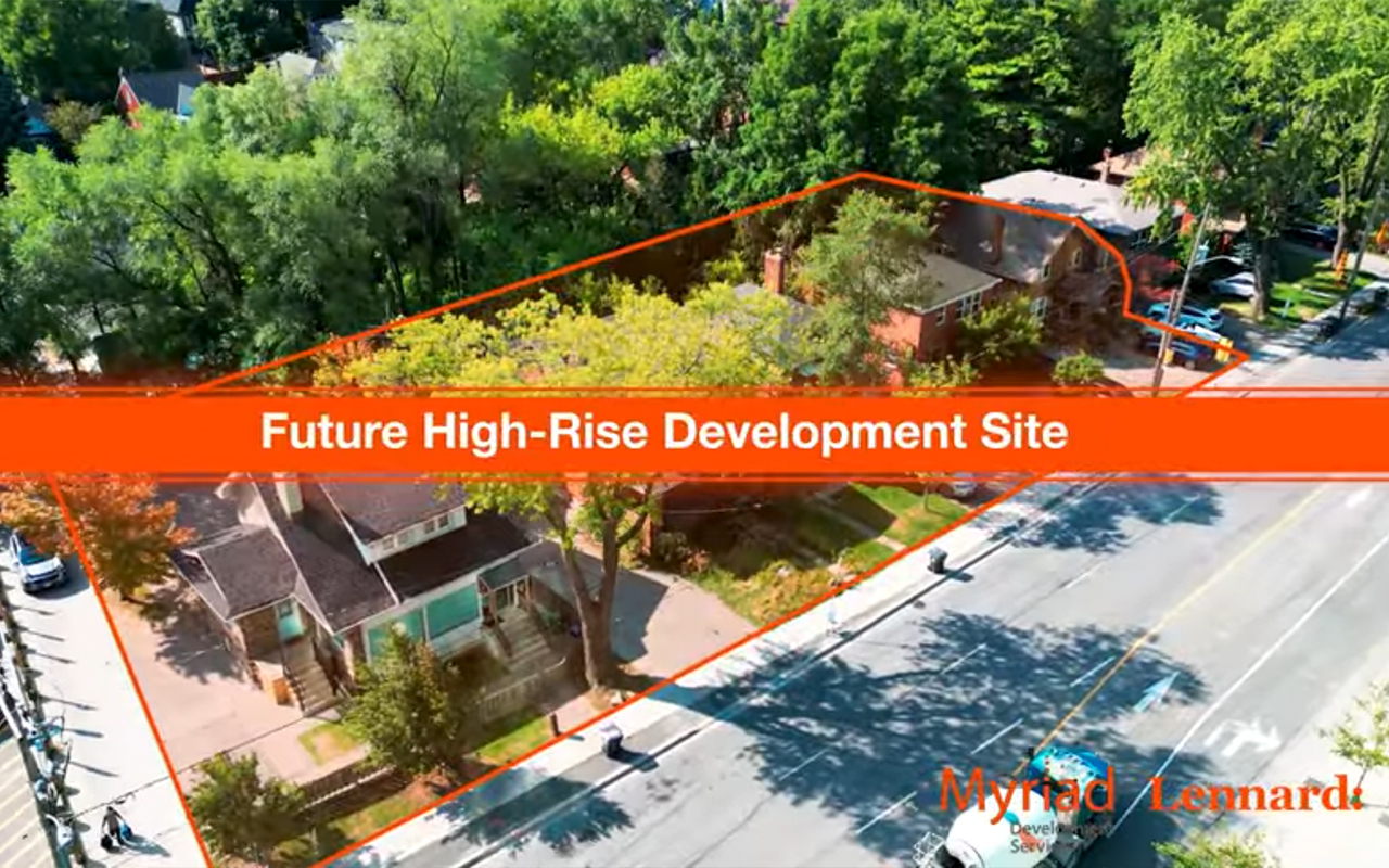 895 Lawrence Avenue E Aerial View with Storefronts and Parking